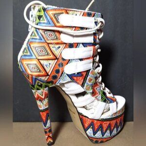 New with out box Funky Eye Candie Heels size 6